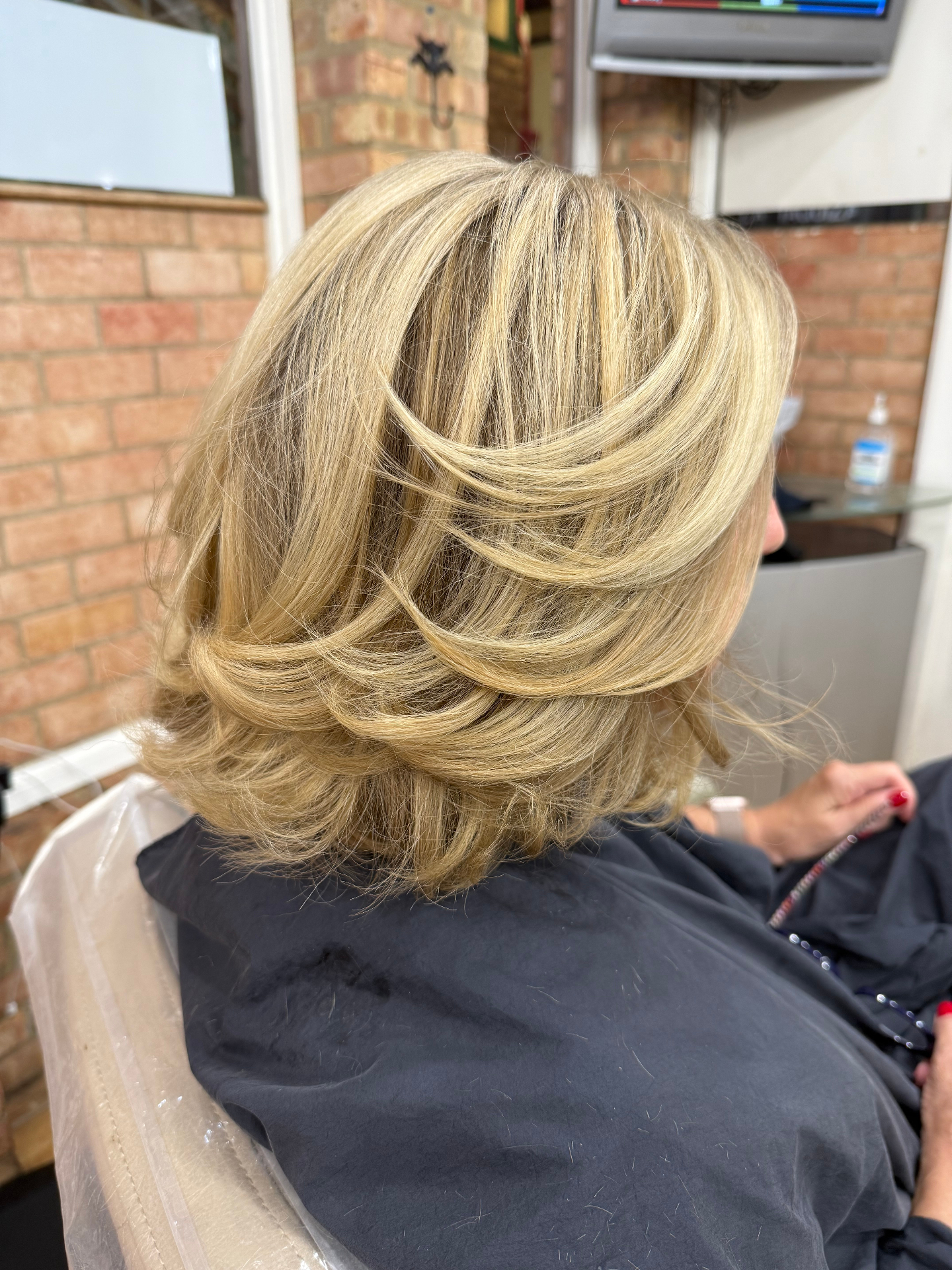 Layered blonde blowout with highlights